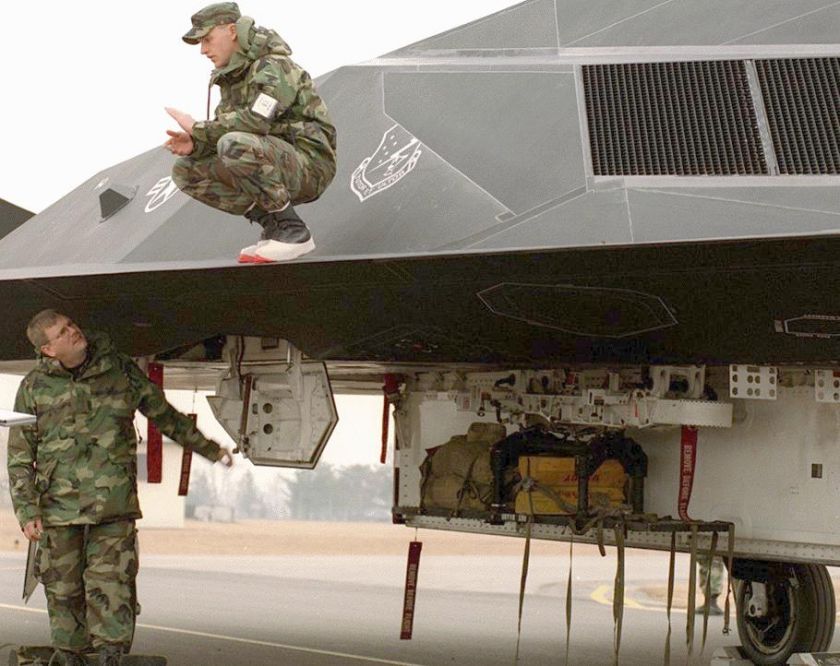   Personnel work on a F 117A Nighthawk from the 49 th Fighter Wing