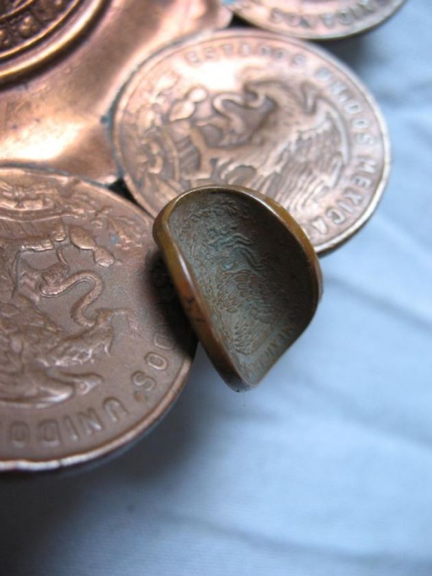 relief the rest of the ashtray is made of copper coins very 