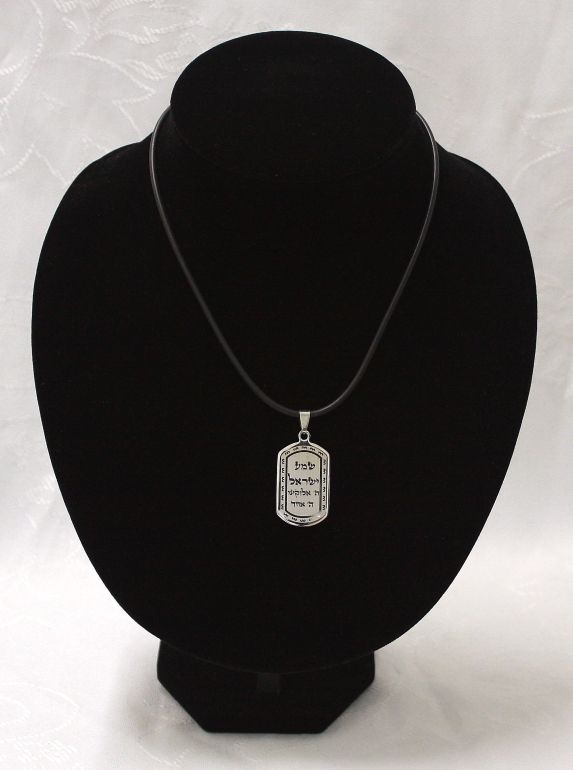 prayer inscribed in hebrew and has a thick rubber necklace