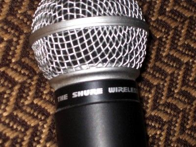   wireless Shure SM58 Dynamic microphones and one zippered Shure bag